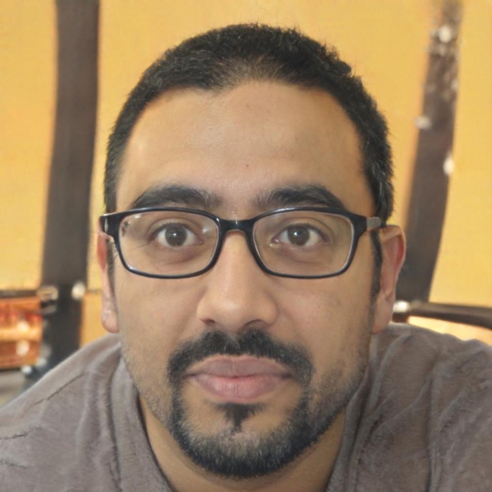 Chef Arvind Malhotra in professional kitchen attire